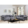 Canapé Chesterfield 2 places capitonné avec rivets de tapissier
