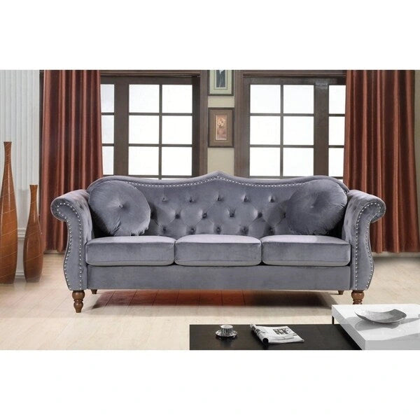 Canapé Chesterfield 2 places capitonné avec rivets de tapissier