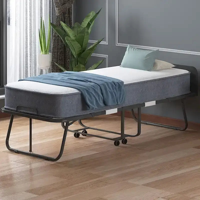 Lit pliable compact avec matelas et roulettes